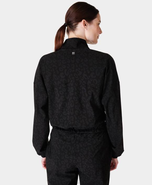 ropa estampado de leopardo en tono negro T28T566 capa intermedia explorer con media cremallera mujer Sweaty Betty