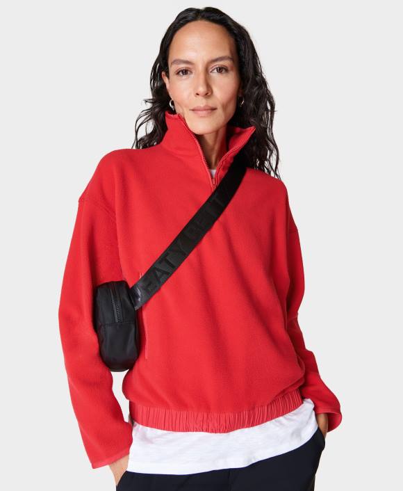 ropa rojo intenso T28T671 jersey de lana malva con media cremallera mujer Sweaty Betty